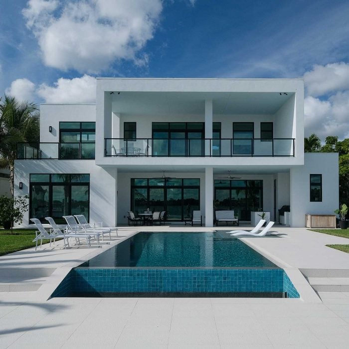 Modern house with pool and palm trees