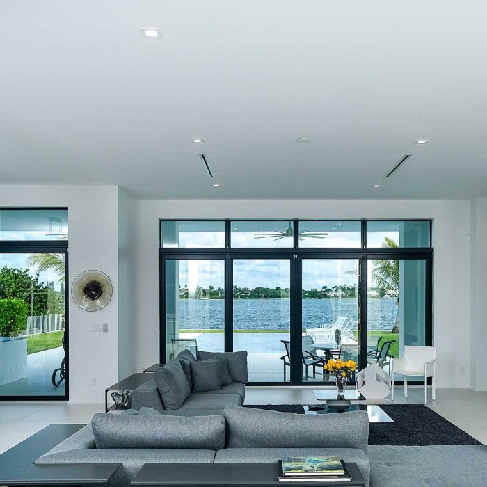 Modern living room with waterfront view