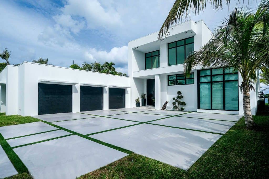 Modern white house with three-car garage