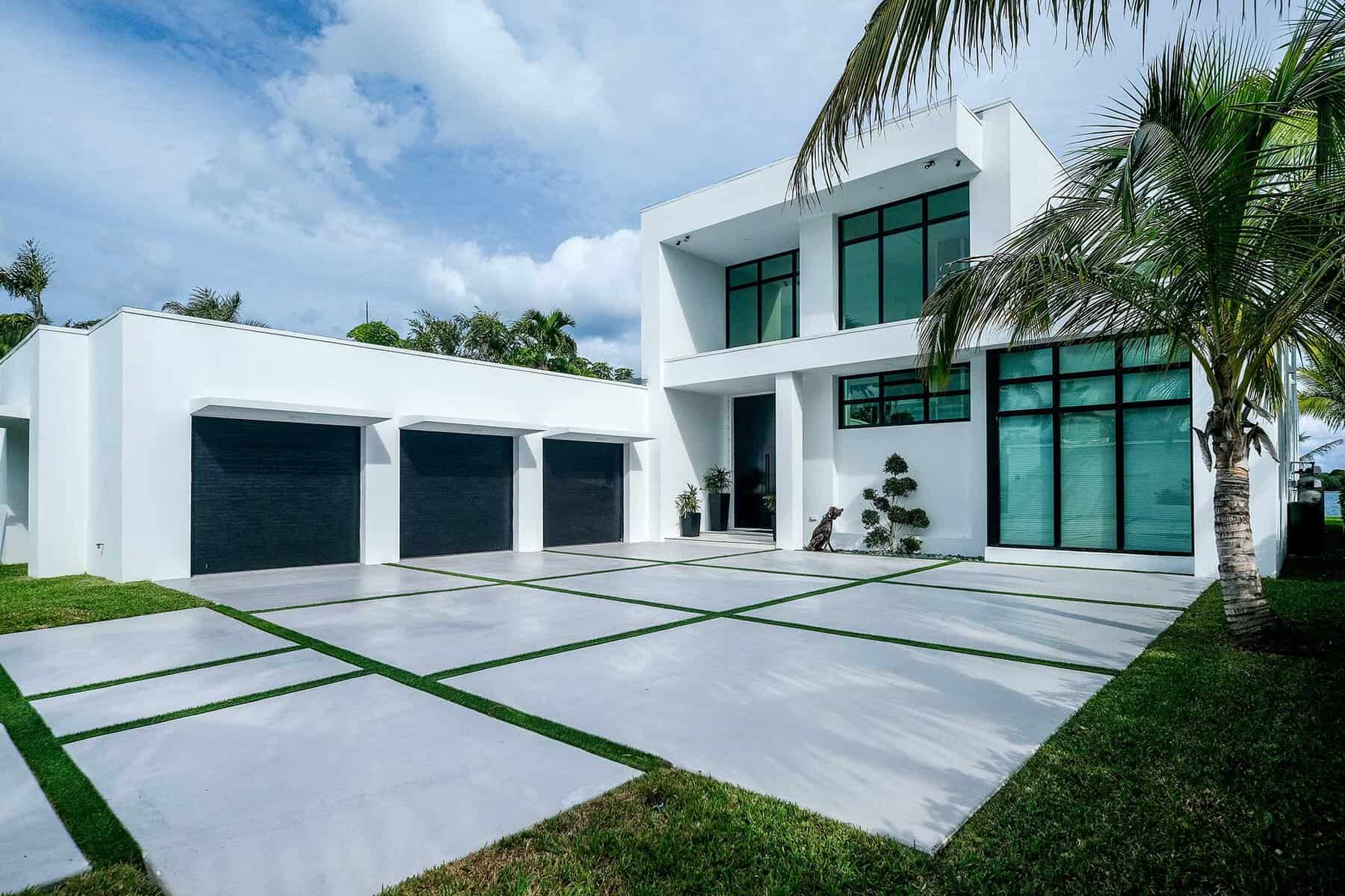 Modern white house with palm tree