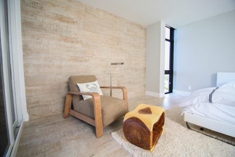 Modern bedroom with chair and wooden table