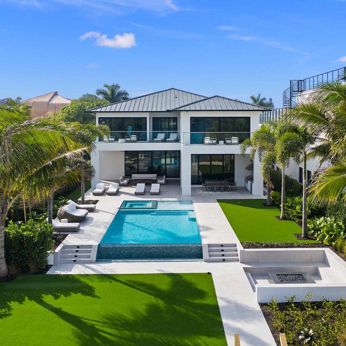 Luxury villa with pool and palm trees