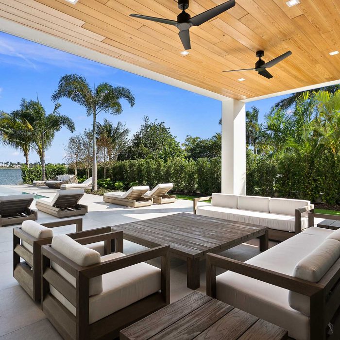 Luxury patio with pool and palm trees