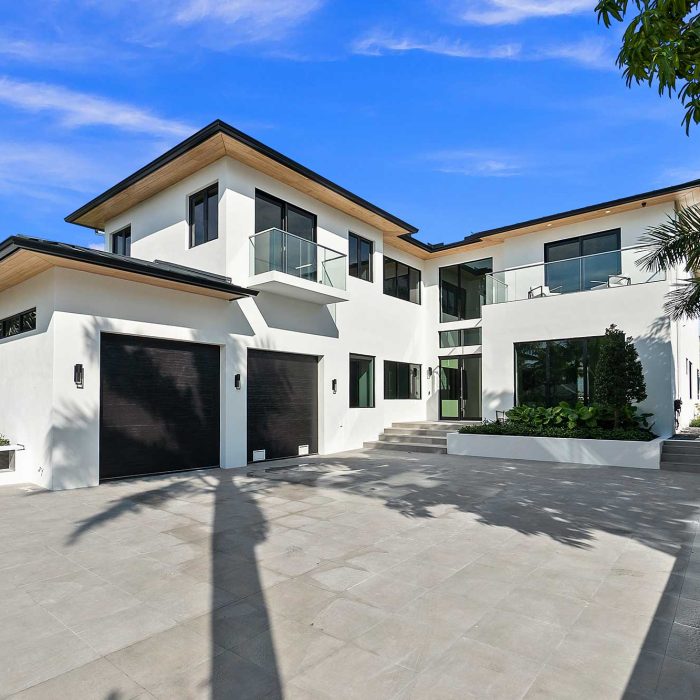 Modern white house with large driveway