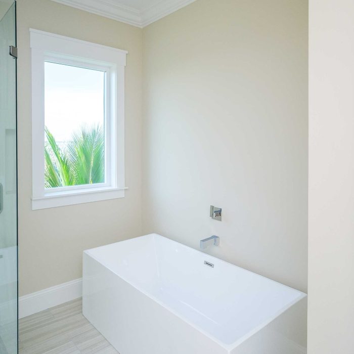 Modern bathroom with a freestanding bathtub.