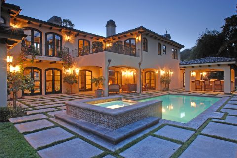 Luxurious villa with pool at dusk