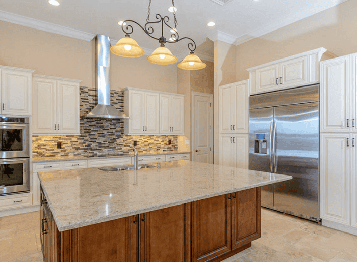 Modern kitchen with island and stainless steel appliances