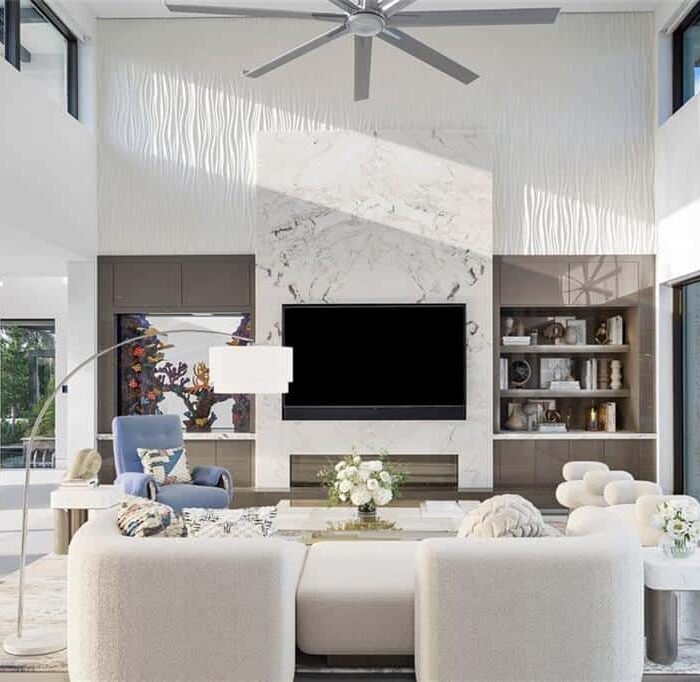 Modern living room with large windows and TV.