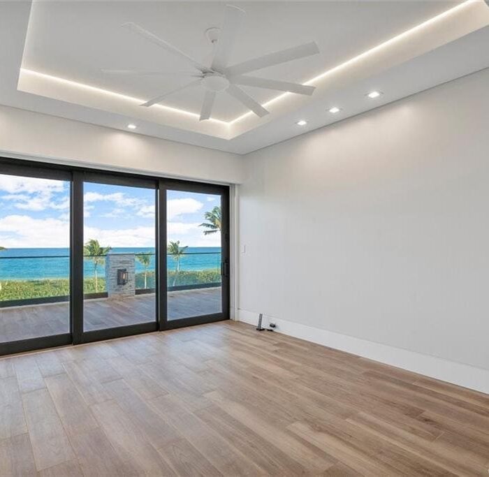 Oceanview room with large glass doors