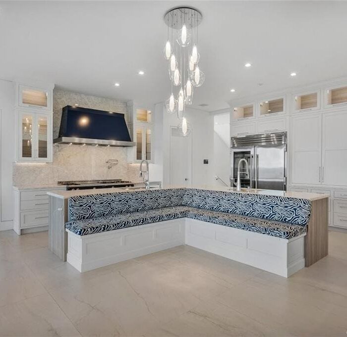 Modern kitchen with island and chandelier
