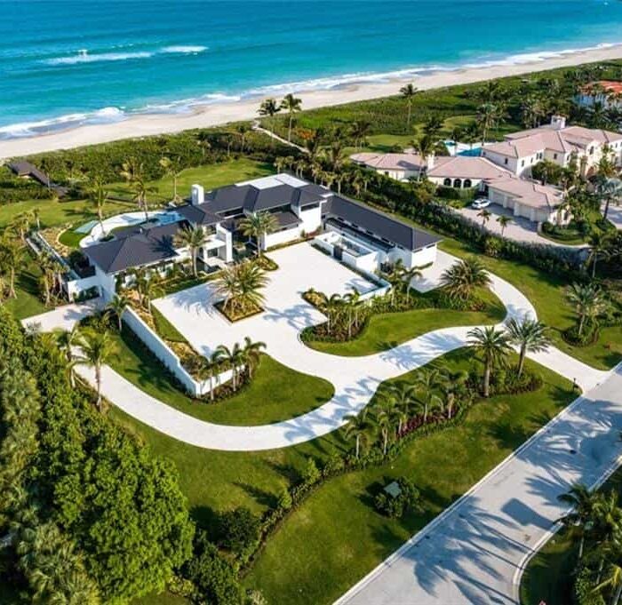 Beachfront mansion with lush gardens and ocean view