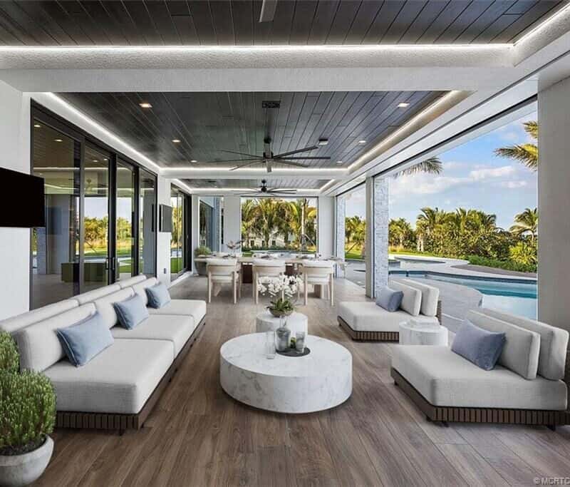 Luxurious outdoor lounge with pool view