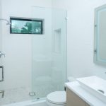 Modern minimalist bathroom with glass shower