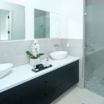 Modern bathroom with sleek vanity and glass shower