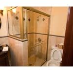 Bathroom with glass shower and toilet