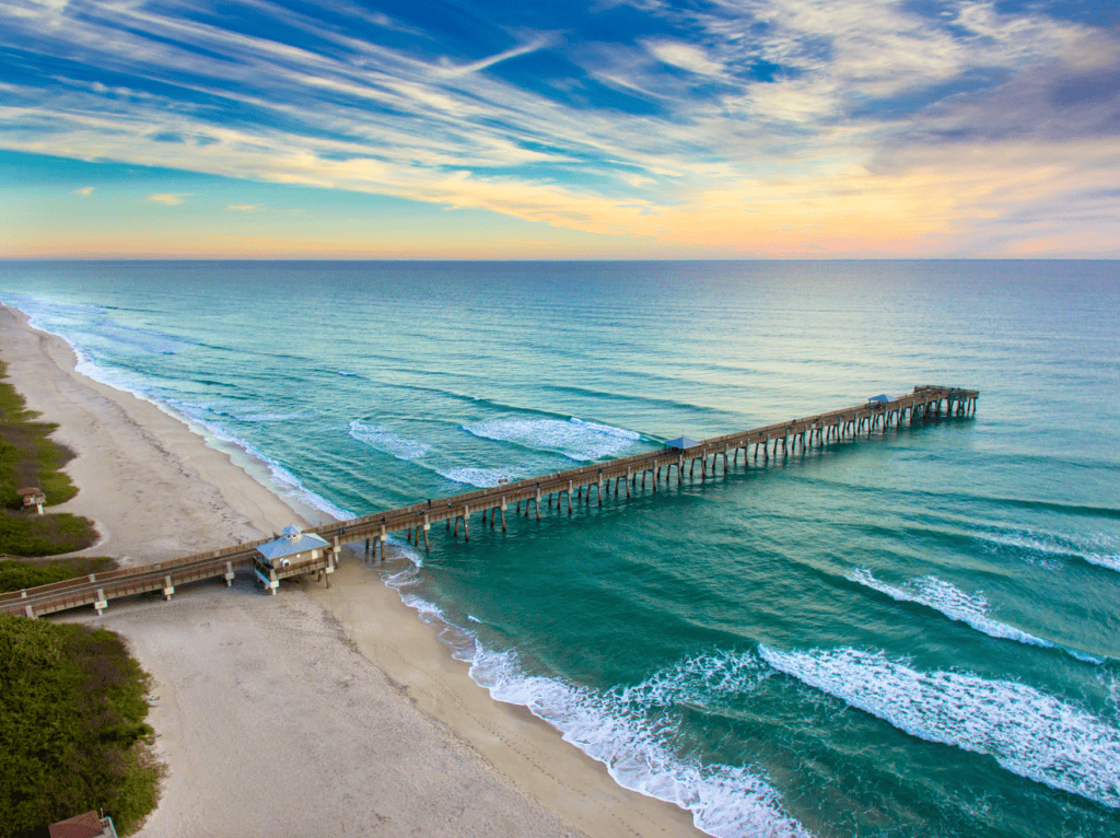 Sunset view of pier on ocean beach