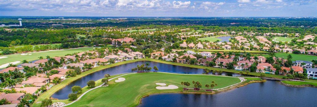 Aerial view of golf course and residential area.