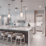 Modern kitchen with island and pendant lighting.