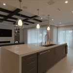 Modern kitchen with sleek island and pendant lights