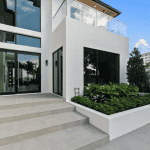 Modern house exterior with plants and windows