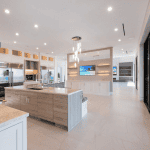 Spacious modern kitchen with island and appliances.